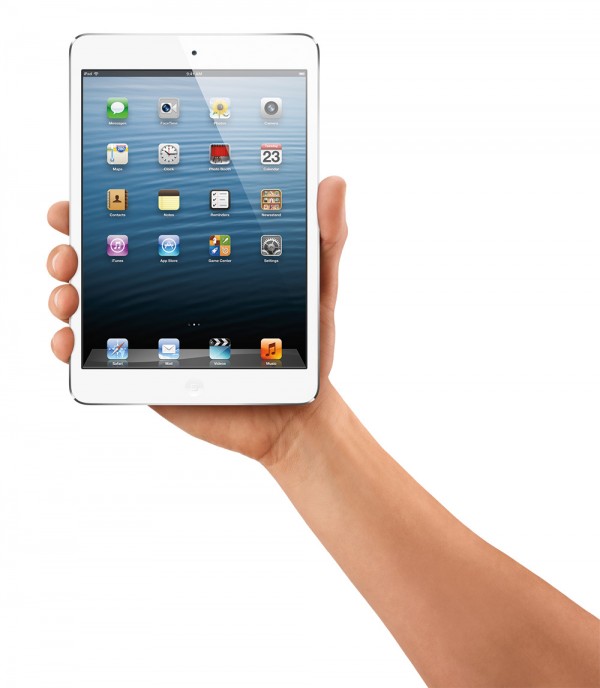 Apple iPad Mini being held by a hand